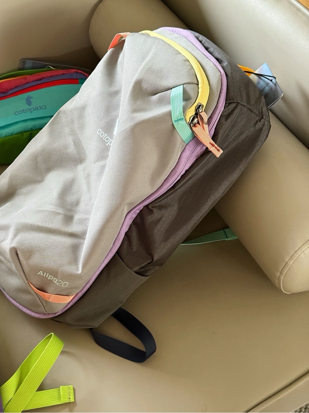 cotopaxi gray backpack with purple, yellow, mint and orange trim - Picture 2 of 6